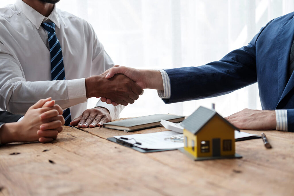 real estate investment meeting of the minds handshake.